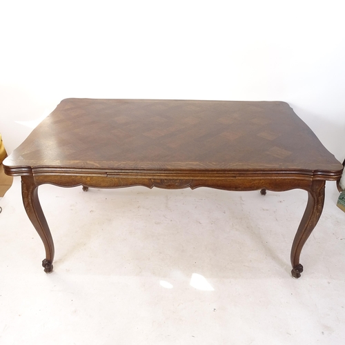 2118 - A French oak parquetry-top draw leaf dining table, L160cm extending to 260cm, H76cm, D100cm