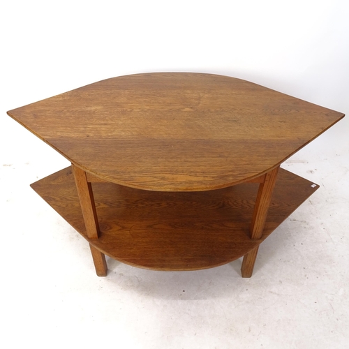 2122 - A 1930s Art Deco eye-shape 2-tier oak coffee table, W113cm, H50cm, D77cm