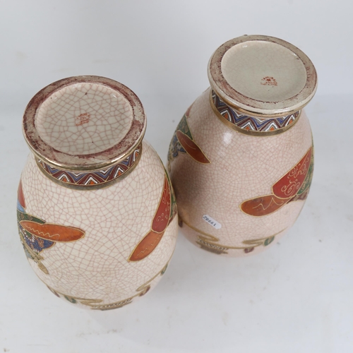 548 - A pair of Japanese crackle glaze vases, with painted and gilded figures, 32cm