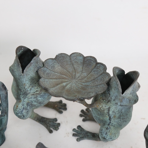 557 - Various verdigris metal frog figures, tallest 15cm