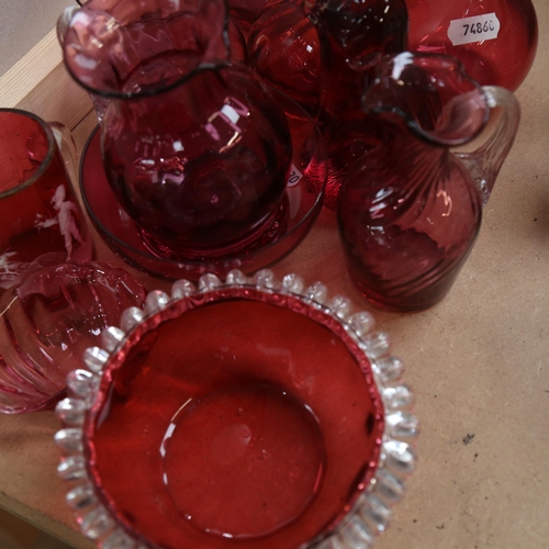 591 - A group of cranberry glass jugs, Wedgwood paperweight, 12cm etc