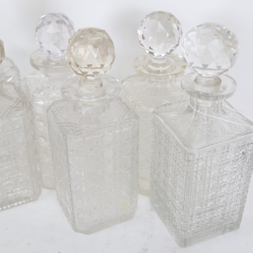 603 - A set of 4 hobnail-cut decanters and stoppers, and a pair of decanters (6)