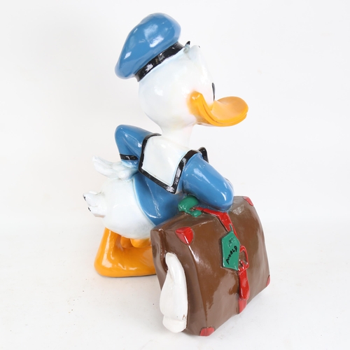 616 - Vintage composition figure of Donald Duck with his suitcase, height 48cm