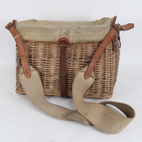 662 - A fisherman's creel, with canvas cover and shoulder strap, 33cm across