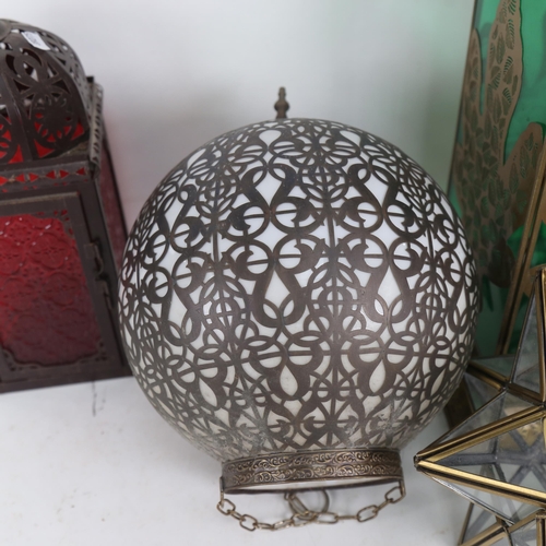 669 - A Moroccan style lantern with green glass panels, 48cm, and 3 other lanterns