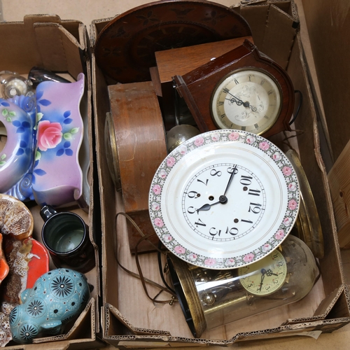 692 - A box of various clocks, and ceramic clock case etc