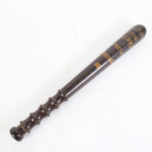 697 - A First World War Period hardwood Police truncheon, marked 