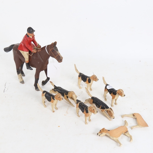 701 - A group of carved and painted wood fox hunting toys, attributed to Frank Whittington of Forest Toys,... 