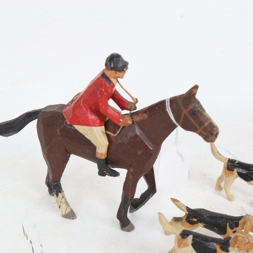 701 - A group of carved and painted wood fox hunting toys, attributed to Frank Whittington of Forest Toys,... 