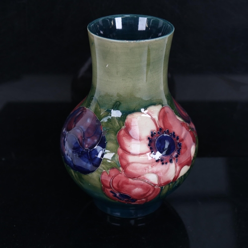 705 - Moorcroft Anemone pattern vase, height 17cm (restored chip on rim)