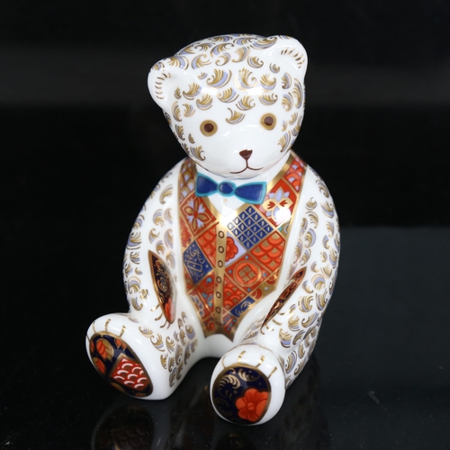 707 - Royal Crown Derby porcelain teddy bear with gold button, height 11cm, boxed