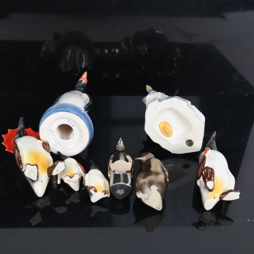 711 - Beswick porcelain penguin family, Rye Pottery penguin etc