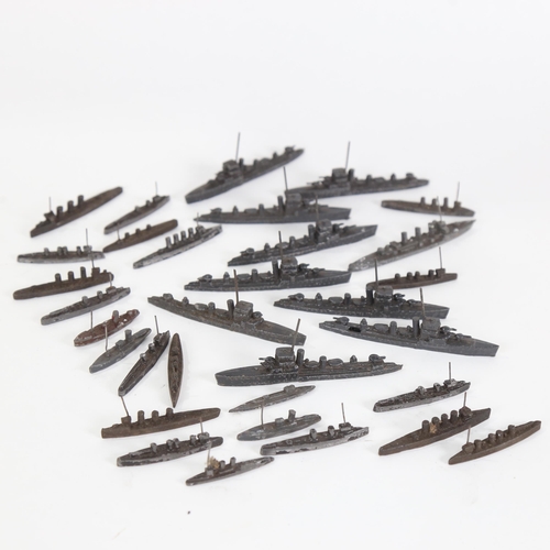 735 - A group of early 20th century lead toy warships and boats