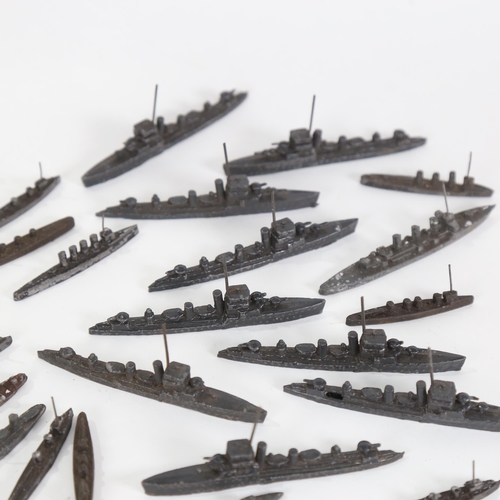 735 - A group of early 20th century lead toy warships and boats