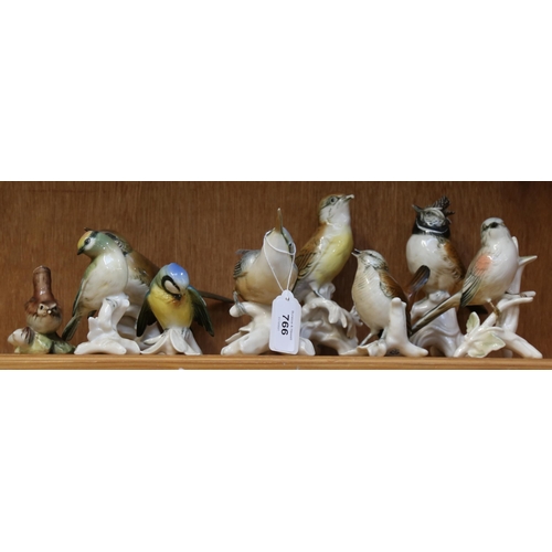 766 - 8 Karl Ens porcelain bird figures, and another unnamed bird, largest height 14cm (9)