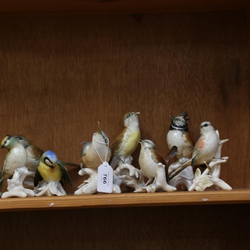 766 - 8 Karl Ens porcelain bird figures, and another unnamed bird, largest height 14cm (9)