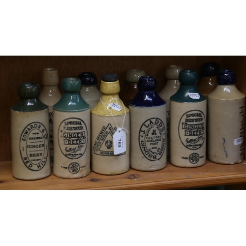 769 - A group of stoneware ginger beer bottles (11)