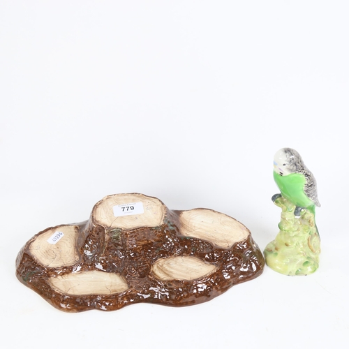 779 - Beswick porcelain budgie, 1217, and Beswick tree stump stand (2)