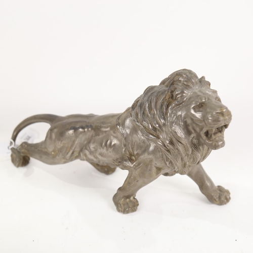 819 - A Chinese spelter lion sculpture, and similar tiger (1 leg detached)