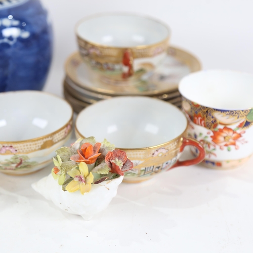 826 - A Chinese blue and white Prunus pattern ginger jar and cover, hand painted and gilded teacups and sa... 