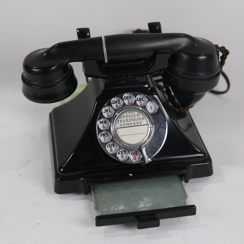 827 - Vintage black Bakelite dial telephone