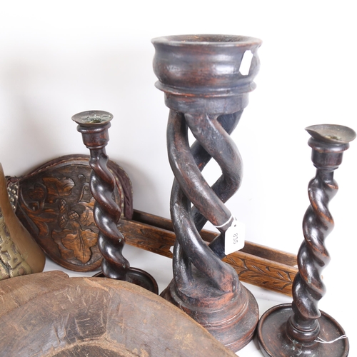 835 - Various carved wood items, including barley twist candlesticks, bellows, food bowl etc