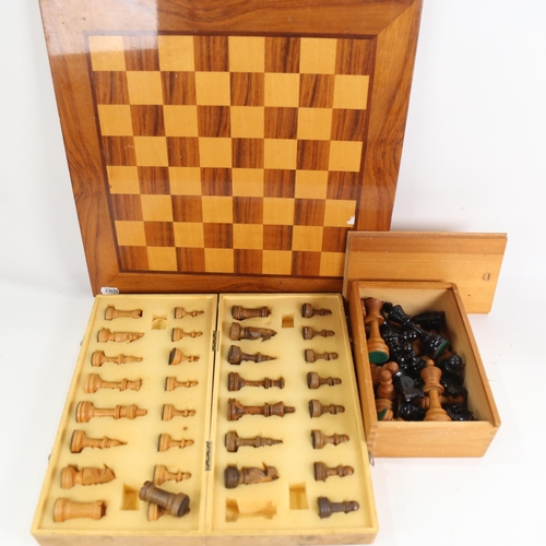 863 - Chess board, various chessmen, and folding travelling chess set