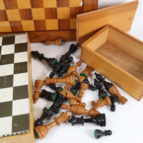 863 - Chess board, various chessmen, and folding travelling chess set