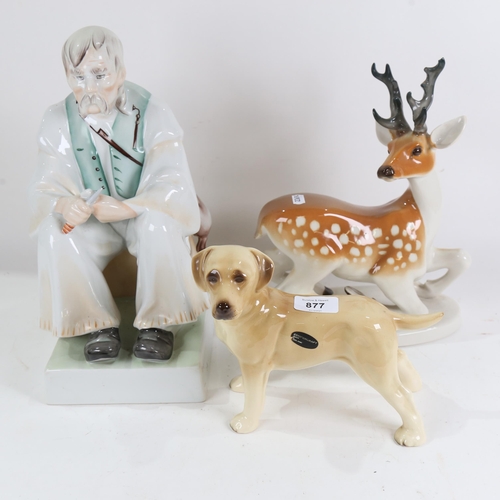 877 - A large Zsolnay Pecs ceramic seated figure, Russian deer figure, and another by Coopercraft (3)