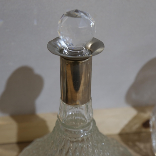 880 - 4 glass decanters and stoppers