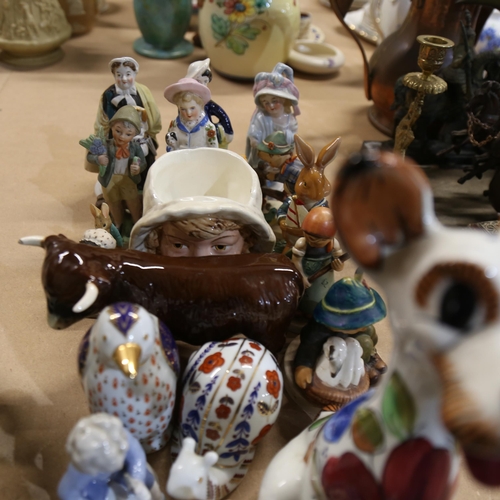 885 - A large quantity of various porcelain figures and ornaments, including Goebels and Wedgwood