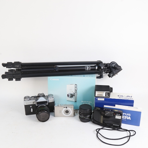 899 - Various cameras and accessories, including Olympus AF-10, Zenit-E, Velbon D-400 tripod etc