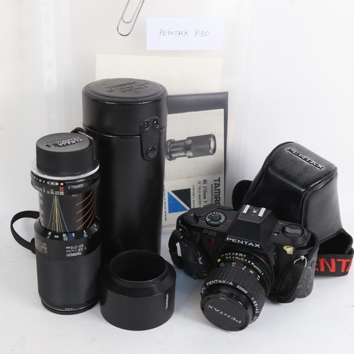 902 - A Pentax SLR P30 camera, with 35-70mm zoom lens, which takes bayonet fitting lens, and a Tamron 80-2... 