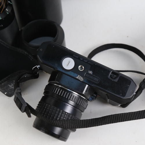 902 - A Pentax SLR P30 camera, with 35-70mm zoom lens, which takes bayonet fitting lens, and a Tamron 80-2... 