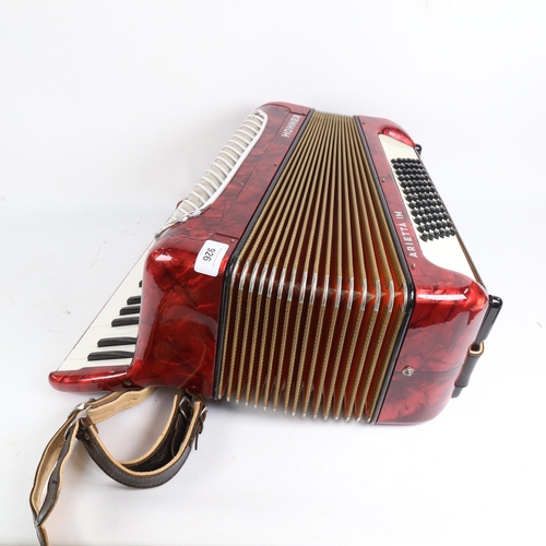 926 - A red Hohner Arietta 1M 2 voice 72 bass accordion, cased