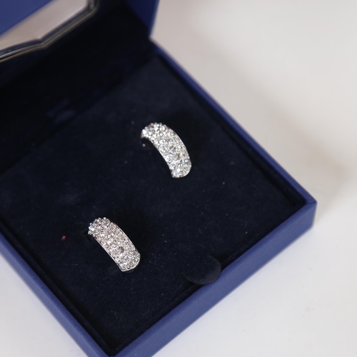 1116 - A pair of Swarovski half hoop clip-on earrings, presented with a Gund teddy bear