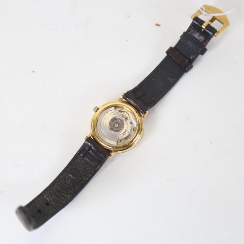 1158 - A gentleman's gold plated wristwatch, with moon phase and date calendar