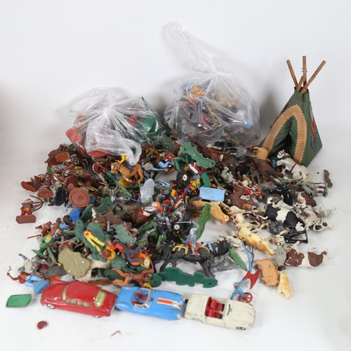 535 - A quantity of plastic and painted metal farm animals, toy figures etc