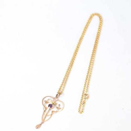 1240 - A delicate 9ct gold and amethyst set pendant, and a gold plated chain