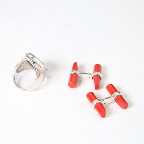 1245 - A silver and stone set dress ring, and a pair of silver and coral-mounted cufflinks