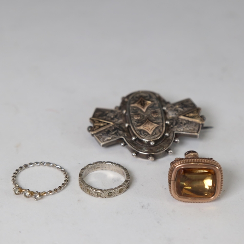 1248 - A Victorian gilt-metal and citrine set fob, an engraved silver brooch with hair panel back, a silver... 