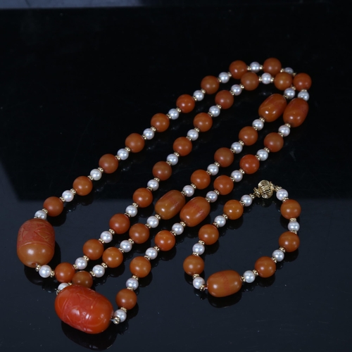 1254 - A single-row amber bead and pearl sautoir necklace, and a matching amber and pearl bead bracelet, wi... 