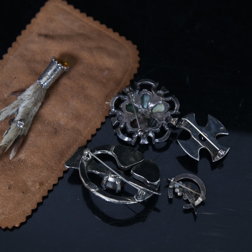 1257 - 3 Scottish design brooches, and a claw design brooch with stone set end