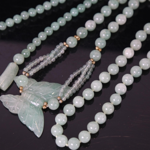 1258 - 2 polished jade bead necklaces, largest length 74cm, 174.7g total (2)