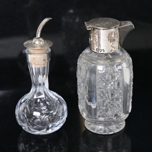 1260 - A glass and silver-mounted olive oil jar, and another