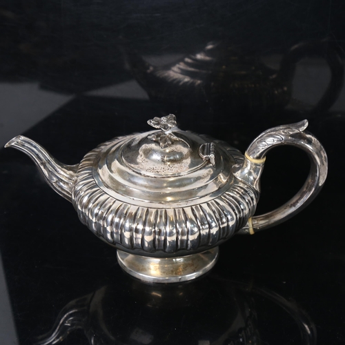 1261 - A George IV silver fluted teapot, hallmarks for London 1827, 16.2oz