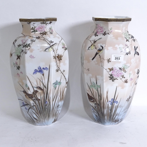 203 - A pair of Japanese hand painted porcelain octagonal vases, height 36cm