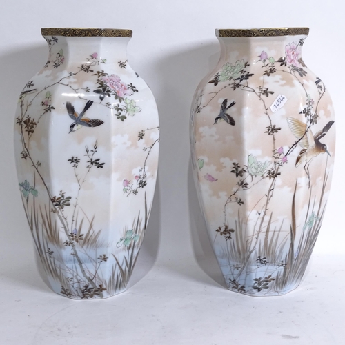 203 - A pair of Japanese hand painted porcelain octagonal vases, height 36cm