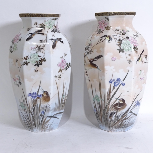 203 - A pair of Japanese hand painted porcelain octagonal vases, height 36cm