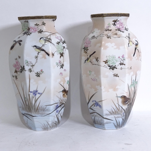 203 - A pair of Japanese hand painted porcelain octagonal vases, height 36cm